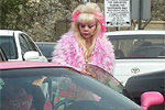 Real Life Barbie with her Pink Corvette