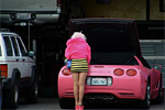Real Life Barbie with her Pink Corvette