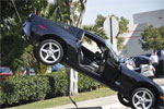 Corvette Lands on Pole Wire After Collision