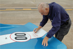 Delmo Johnson signing the Corvette