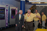 Kentucky Governor Steve Beshear gets a tour of the National Corvette Museum from Executive Director Wendell Strode.