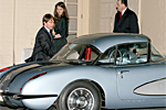 Tom and Katie exit their 1958 Corvette.