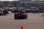 [PICS] Man Struggles to a Fit Giant Stuffed Bear in his C5 Corvette Convertible