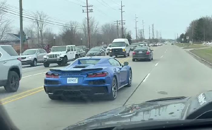 [SPIED] 2023 Corvette Z06 Convertible in Elkhart Lake Blue Driving in Traffic