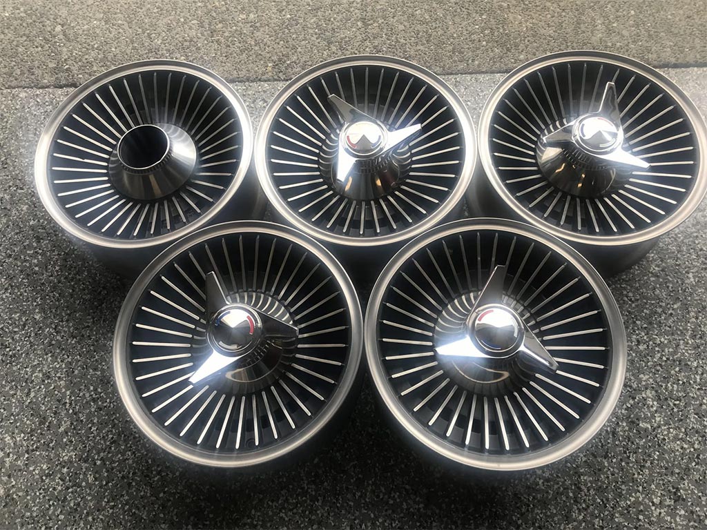 A Set of Five Kelsey-Hayes Knock Off Wheels Offered on Bring a Trailer
