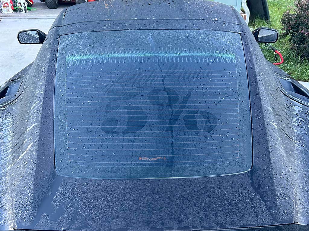 Decal Residue On Window of a 2016 Corvette Coupe Reveals Previous Celebrity Owner