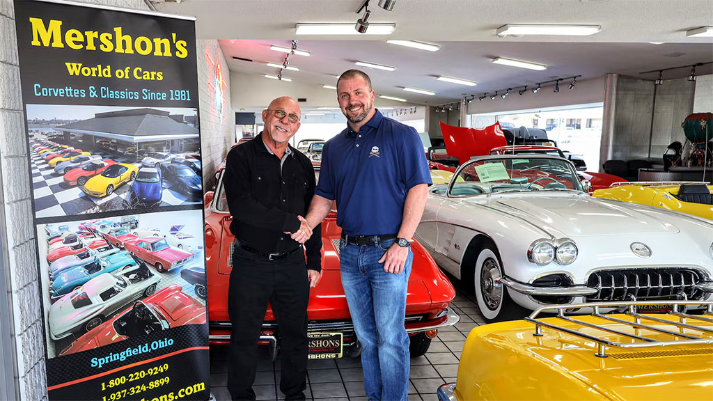 Dan Mershon stands proudly outside Mershon's World of Cars dealership