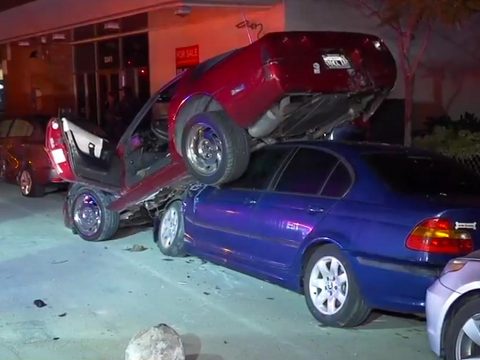 [ACCIDENT] C4 Corvette Driver Crashes Into Parked Cars and Winds Up Stuck On Top a BWM